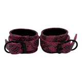 Wrist cuffs in Pink Snake with Black Hardware One Size